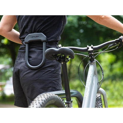 Hiplok DX attached to cyclist's belt
